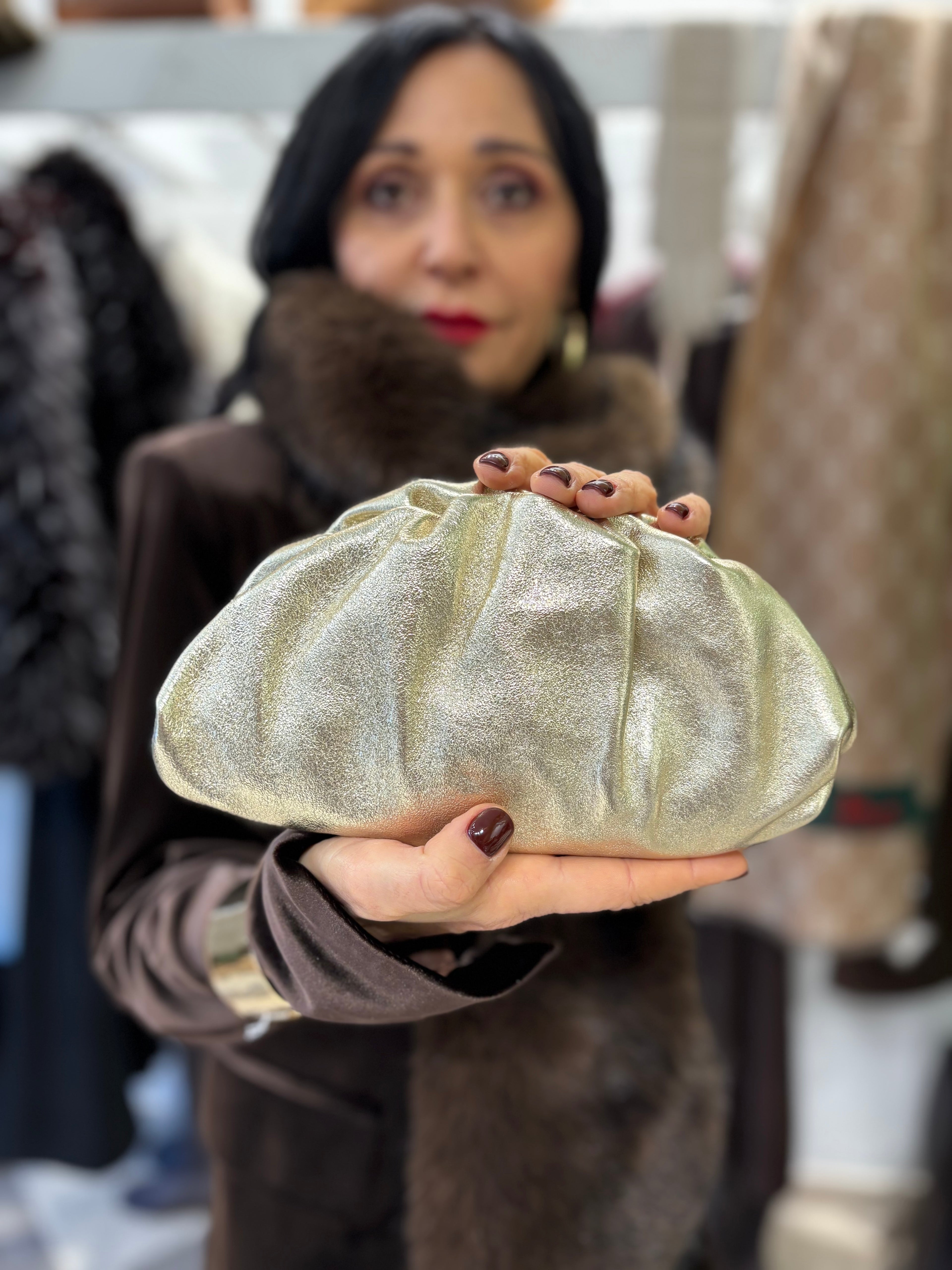 Mini pouch in vera pelle oro