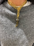 Collana con charm corno nero e maglia catena oro