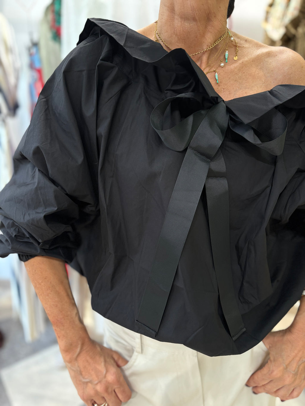 Blusa volant noir