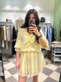 Mini abito con rouches color giallo