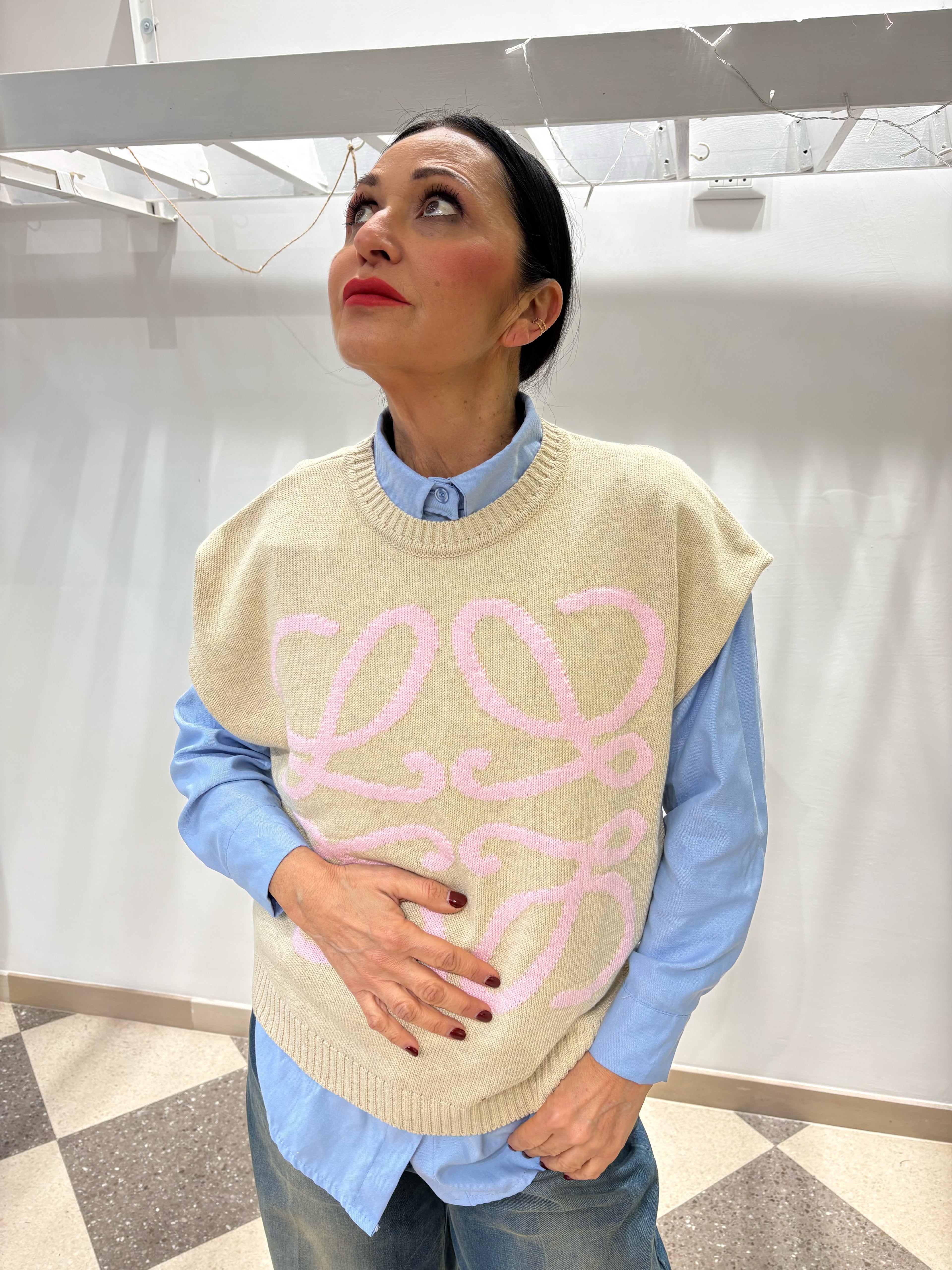 Motel | Gilet fondo panna e motivo rosa