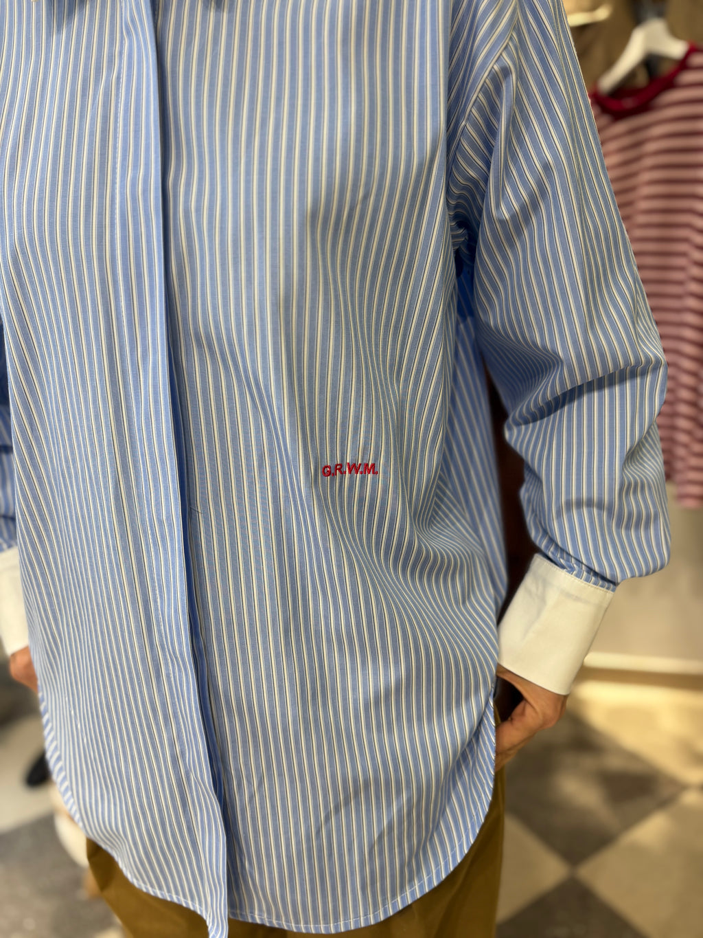 Camicia a righine fondo celeste