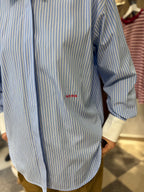Camicia a righine fondo celeste