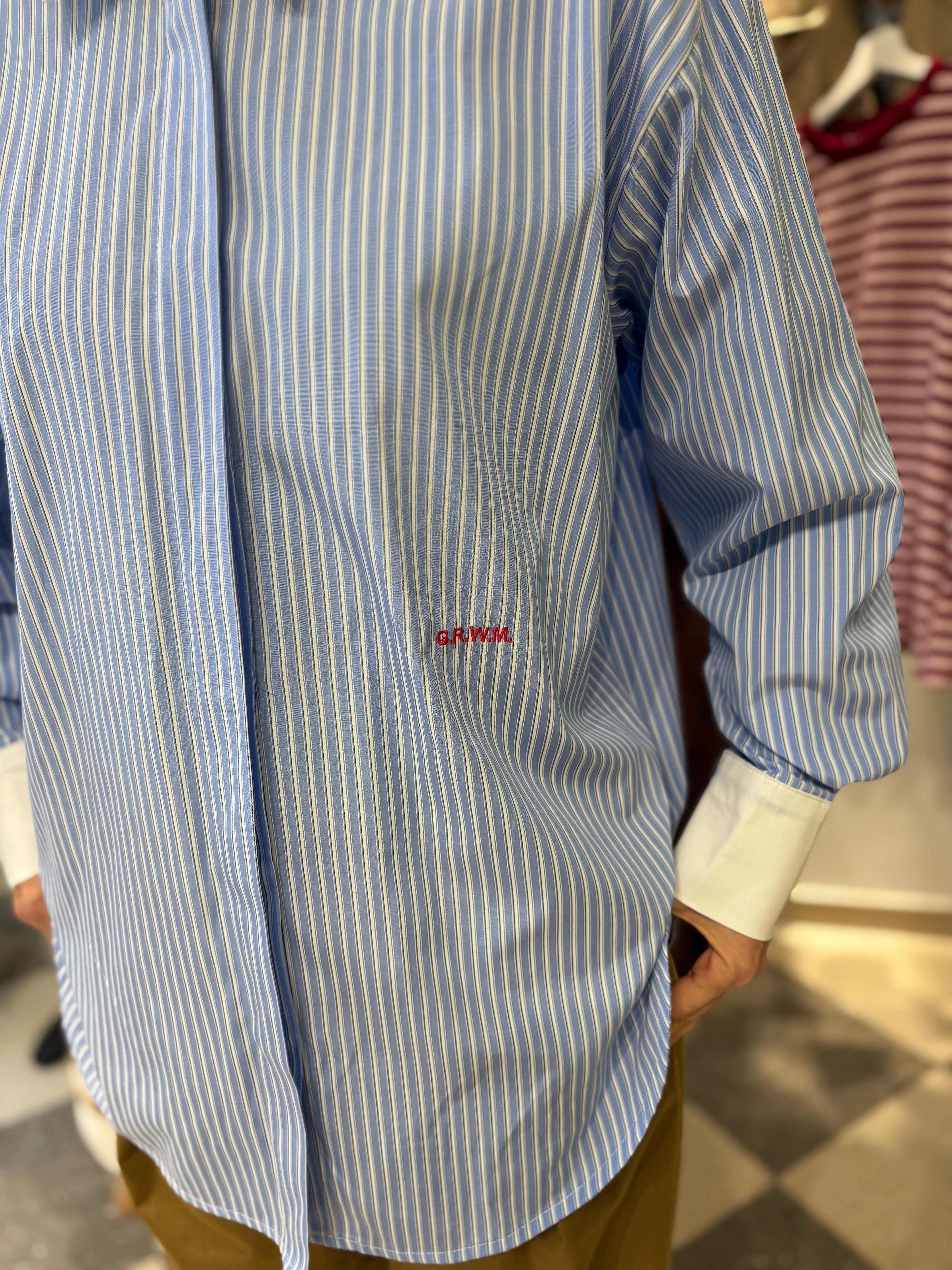 Camicia a righine fondo celeste