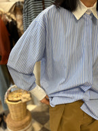 Camicia a righine fondo celeste