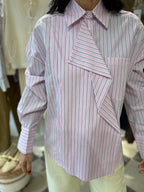 Camicia asimmetrica fondo rosa
