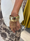 Bracciale rigido martellato con frange
