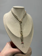 Collana con perline panna e oro e charm pesciolino