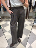 Pantalone palazzo check marrone con riga blu