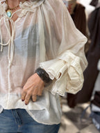 Blusa leggera avorio con rouches e laccetti