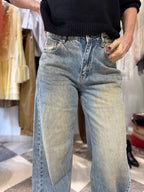 Pantalone wide leg dettaglio ecopelle tasca sul retro